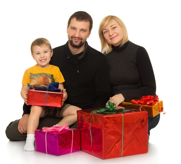 The family enjoys the gifts — Stock Photo, Image