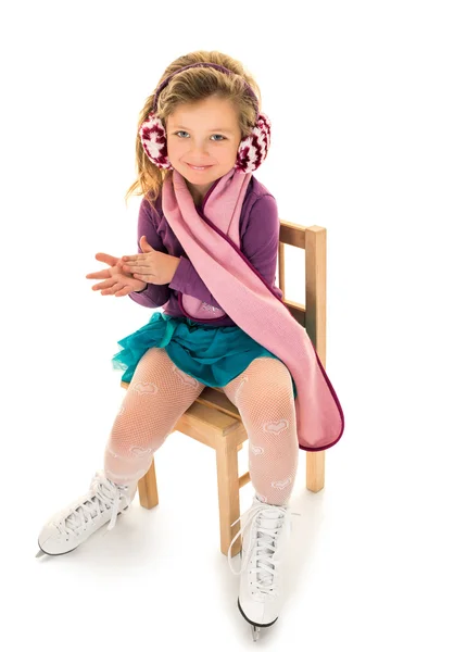 Skater sitting on a chair — Stock Photo, Image