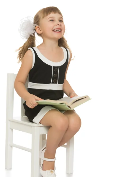 Menina com um livro — Fotografia de Stock