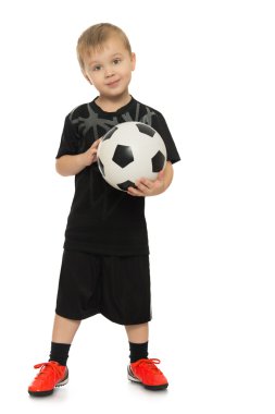 Futbol topu ile küçük çocuk