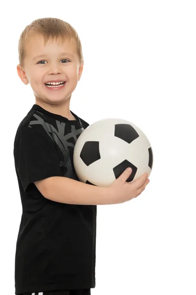 Kleiner Junge mit Fußball — Stockfoto