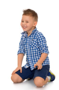 Oğlan yerde yatıyor