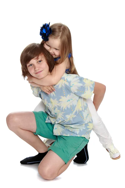 Brother and sister hugging — Stock Photo, Image