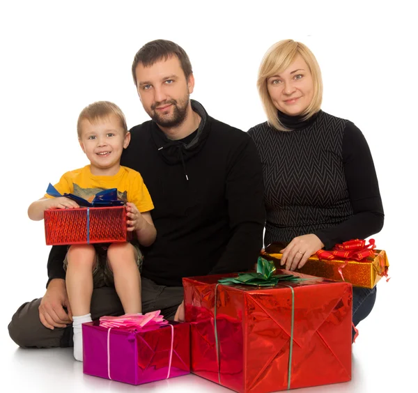 The family enjoys the gifts — Stock Photo, Image