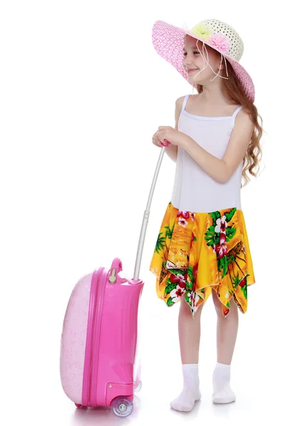 Dziewczyna z różowy walizka — Zdjęcie stockowe