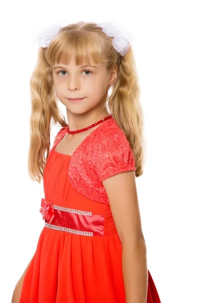 Malá holčička v oranžové šaty — Stock fotografie