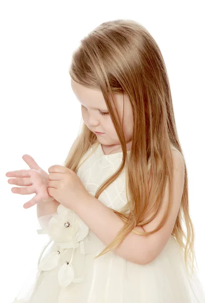 Little girl in white dress Stock Photo