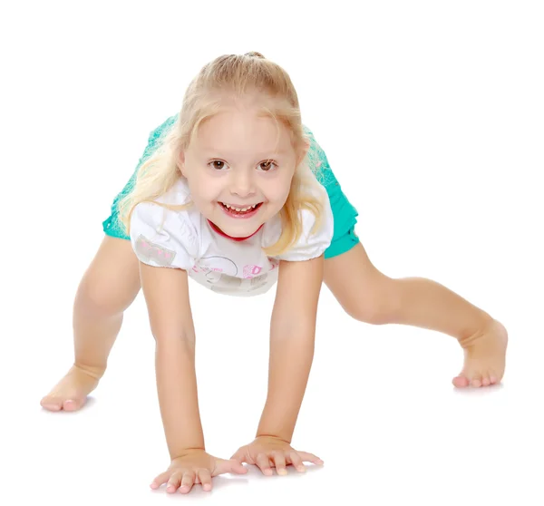 Menina brincando no chão — Fotografia de Stock