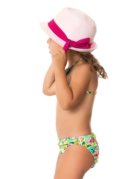 girl in a bathing suit and hat