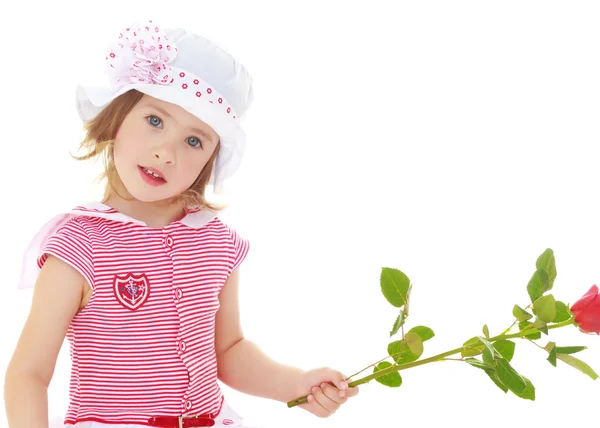 Meisje houdt van een roos — Stockfoto