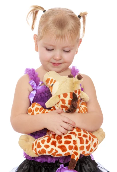 Bambina con un peluche — Foto Stock