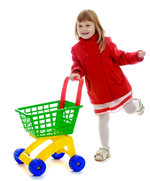 Little girl with shopping cart — Stock Photo, Image