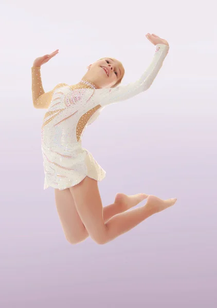 Little gymnast jumping — Stock Photo, Image