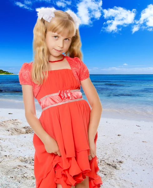 Little girl in orange dress — Stock Photo, Image