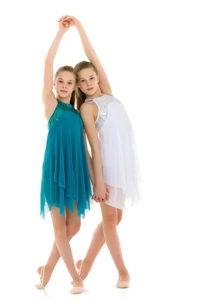 Гарненькі дівчата гімнастки Виконуючи ритмічну гімнастику Вправа . — стокове фото