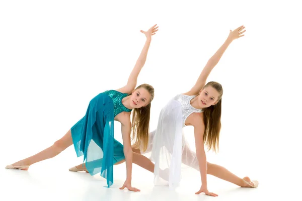 Pretty Girls Gymnasts Performing Rhythmic Gymnastics Exercise. — Stock Photo, Image