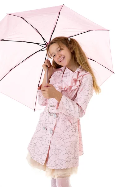 Menina adolescente bonita sob guarda-chuva rosa — Fotografia de Stock