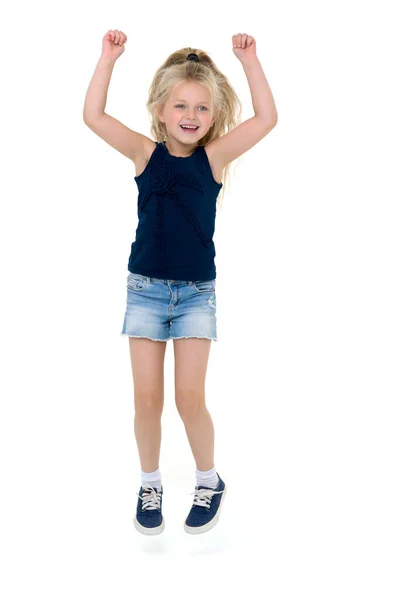 Happy girl jumping with raising hands — Stock Photo, Image