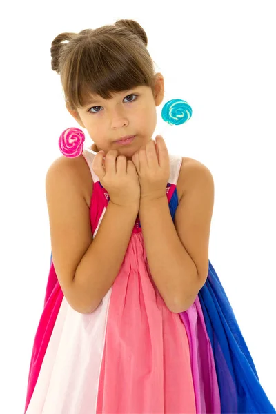 Pretty girl posing with lollipops — Stock Photo, Image