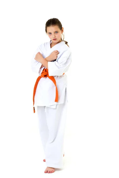 Nastolatka ubrana kimono z pomarańczowym paskiem — Zdjęcie stockowe