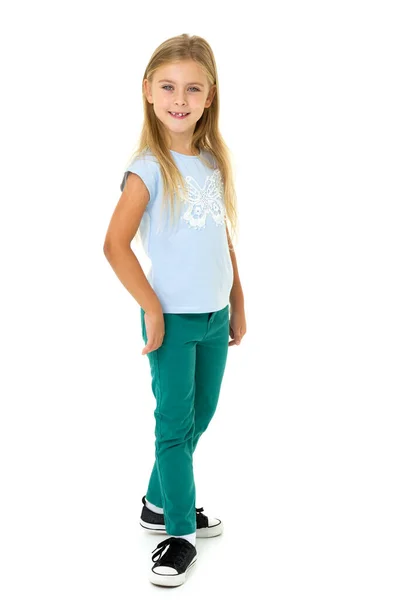 Cute little girl in t-shirt and jeans — Stock Photo, Image