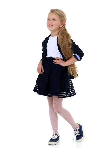 Menina loira em uniforme escolar. Isolado sobre fundo branco — Fotografia de Stock