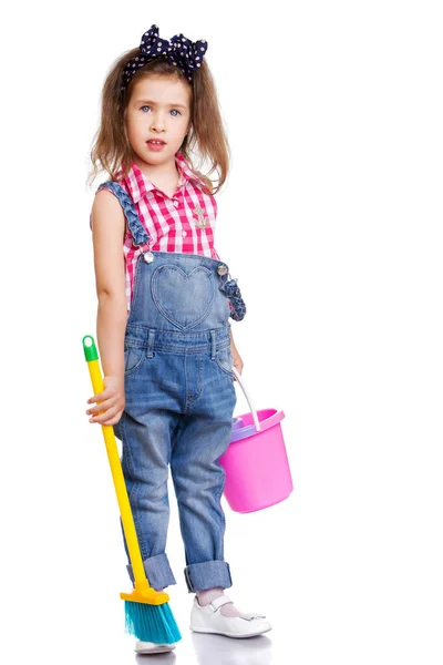 Adorable little girl in denim overalls Stock Picture