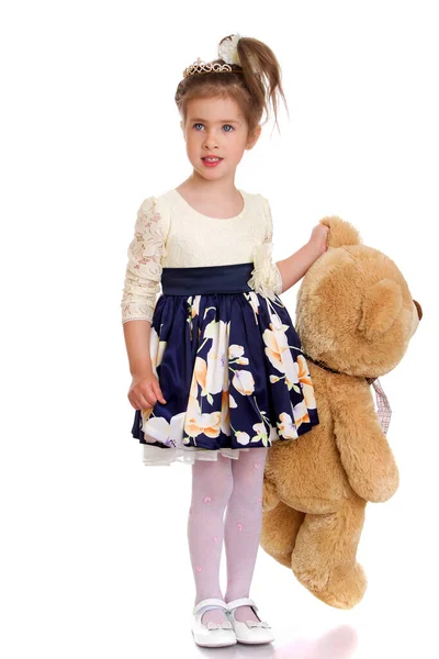 Little girl with teddy bear. Isolated on white background. — Stock Photo, Image