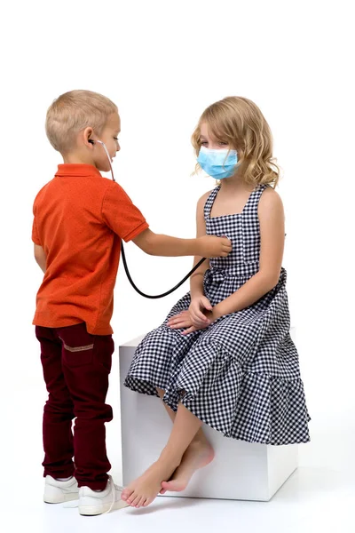 Cute children playing doctor and patient — Stock Photo, Image