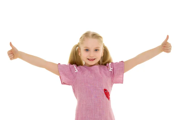 The little girl spread her arms to the sides, childrens emotions. — Stock Photo, Image