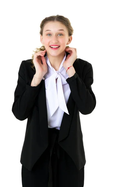 Glad glad student flicka i formell svart kostym — Stockfoto
