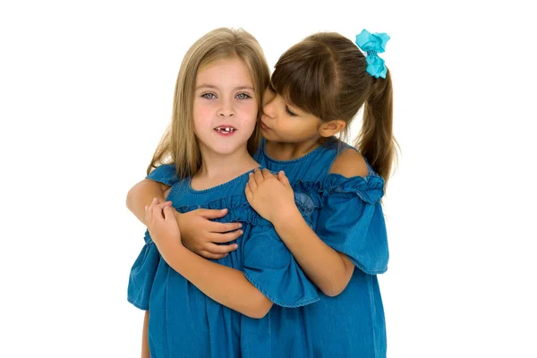 Two happy girls hugging each other — Stock Photo, Image