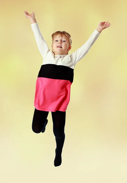 Little girl jumping high. — Stock Photo, Image