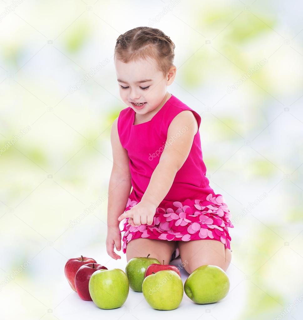 young girl sitting on the lap considers lying