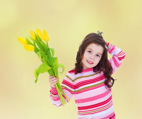 Cute charming girl in a red striped — Stock Photo, Image