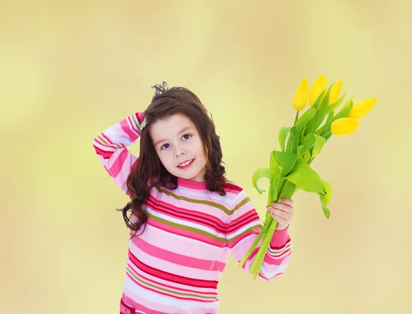 Charming little girl a bouquet — Stock Photo, Image