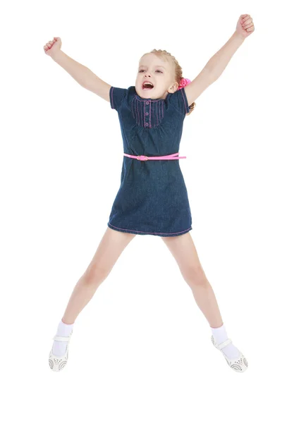 Charming little girl jumping high lifted up his hands — Stock Photo, Image