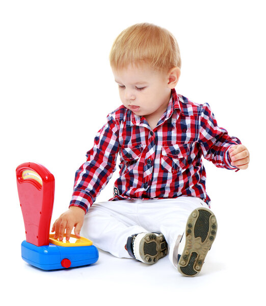 Little boy playing in the store.