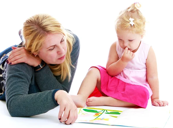 Mother and little daughter playing an exciting game — Stock Photo, Image
