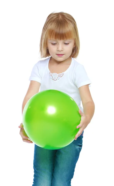 Little girl in blue jeans. — Stock Photo, Image