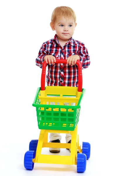 Little boy playing in the store. — Stock Photo, Image