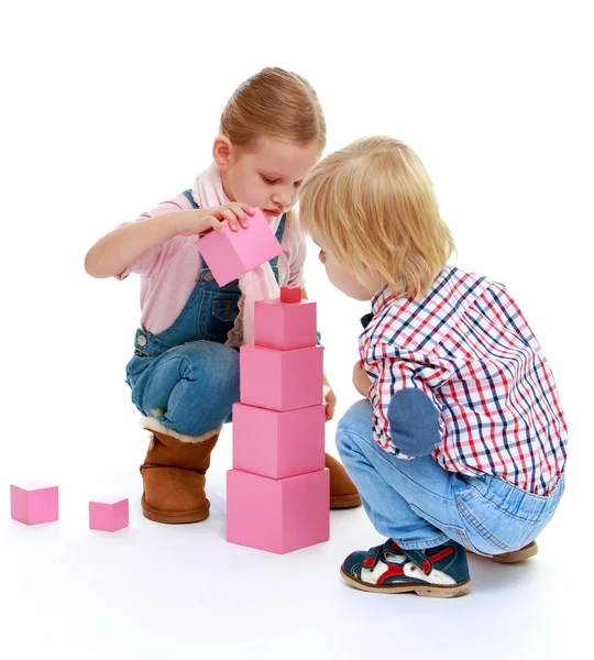 Children playing with blocks. — Stock Photo, Image