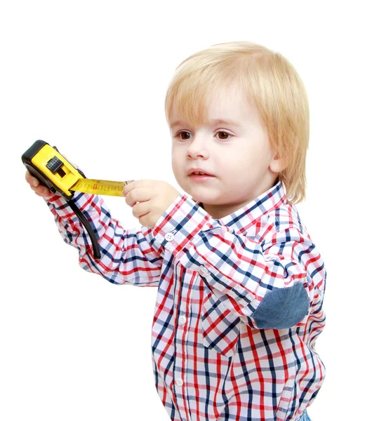 Little boy stretches roulette. — Stock Photo, Image