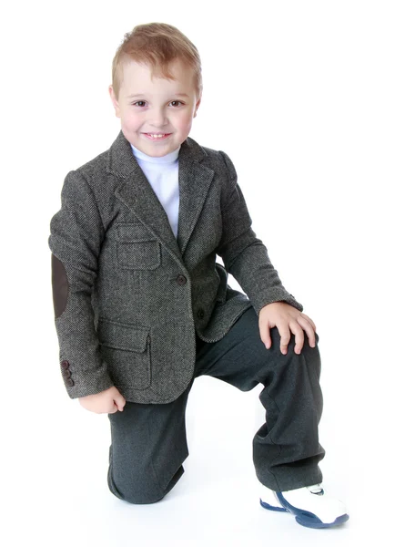 Studio porträtt av en liten pojke. — Stockfoto