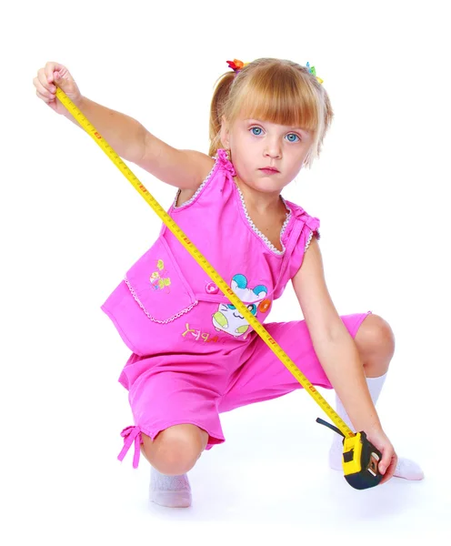 Little girl in a pink suit. — Stock Photo, Image