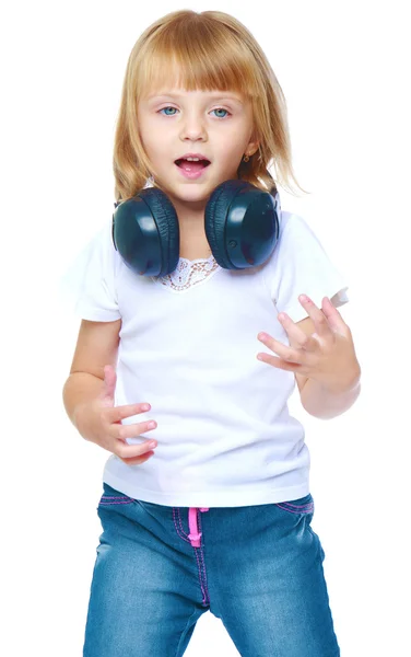 Little girl in blue jeans. — Stock Photo, Image