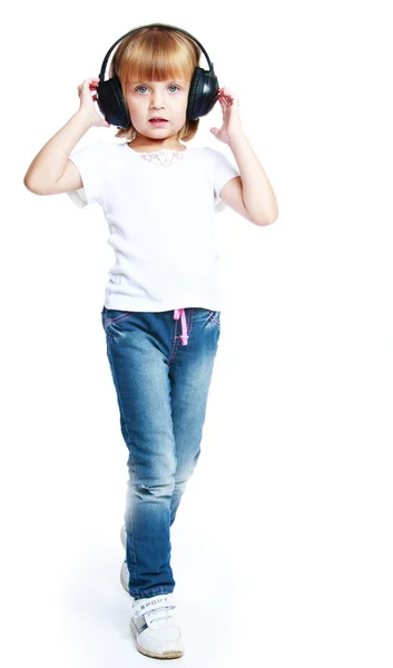 Little girl in blue jeans. — Stock Photo, Image