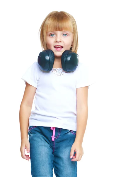 Little girl in blue jeans. — Stock Photo, Image