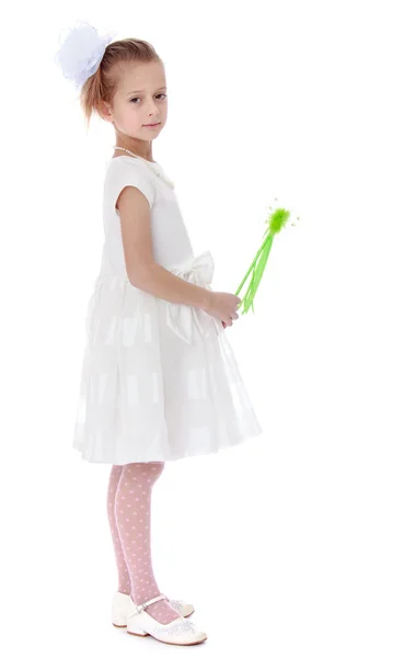 Charming little girl with a magic wand. — Stock Photo, Image