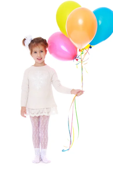 Beautiful little girl in a white dress — Stock Photo, Image